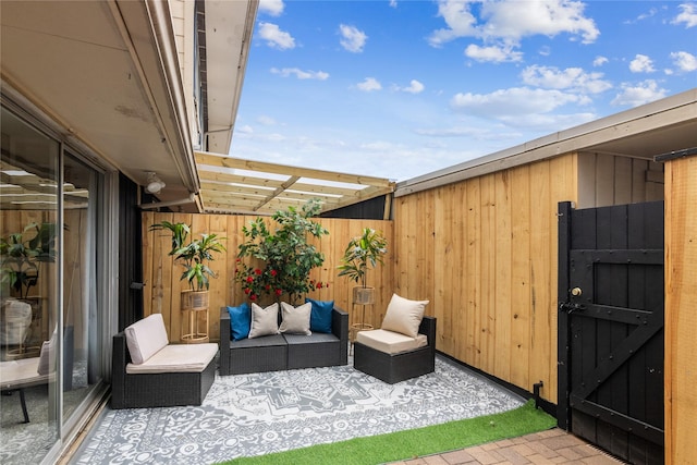 6429 Burgoyne Rd Unit 15, Houston, TX 77057 - view of patio featuring an outdoor living space