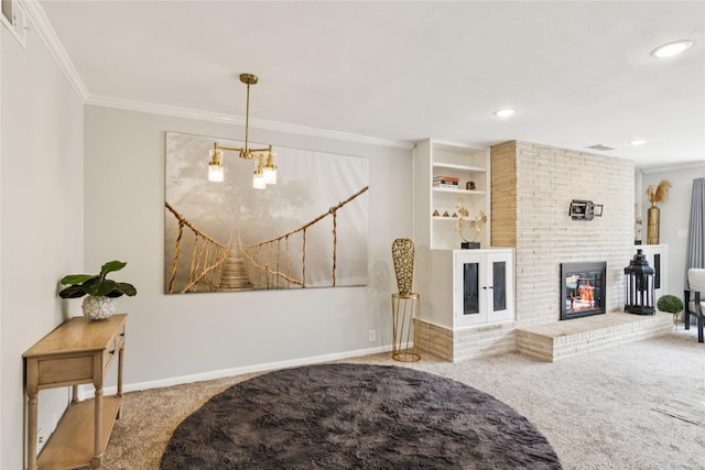 6429 Burgoyne Rd Unit 15, Houston, TX 77057 - carpeted living room featuring ornamental molding, a fireplace, recessed lighting, and a chandelier
