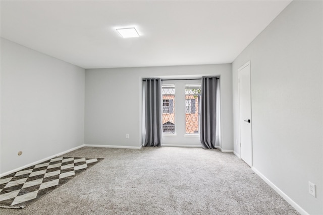 6429 Burgoyne Rd Unit 15, Houston, TX 77057 - carpeted spare room with baseboards