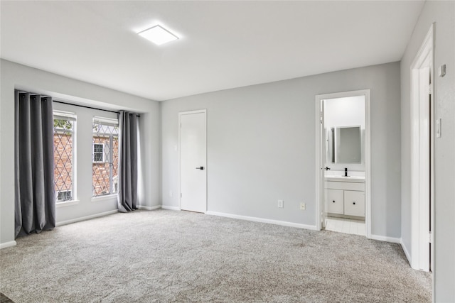 6429 Burgoyne Rd Unit 15, Houston, TX 77057 - unfurnished bedroom featuring carpet floors and ensuite bath