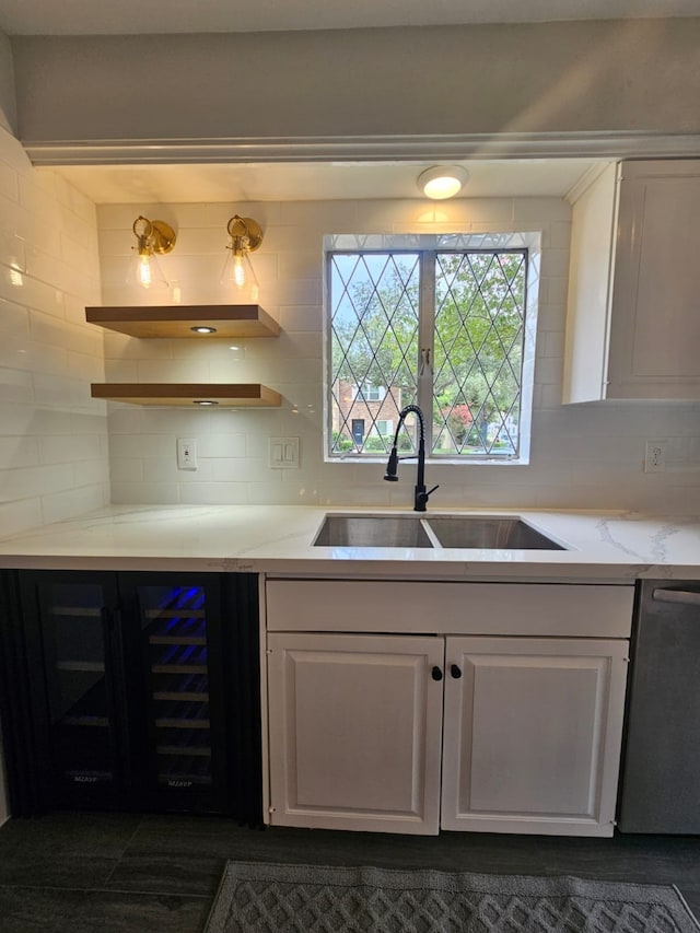 6429 Burgoyne Rd Unit 15, Houston, TX 77057 - kitchen with dishwasher, open shelves, white cabinetry, and tasteful backsplash