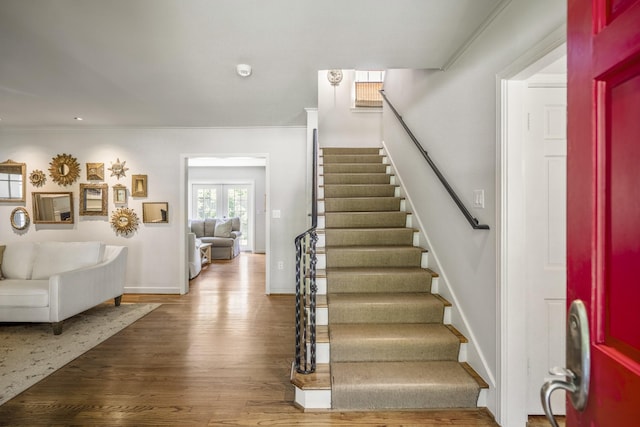 2717 University Blvd, Houston, TX 77005 - staircase with wood finished floors, ornamental molding, and recessed lighting