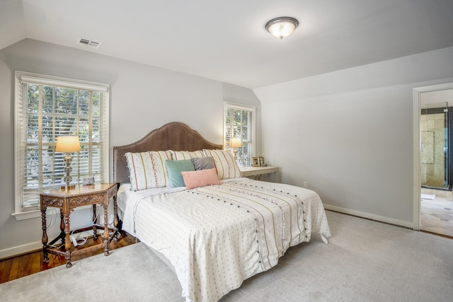 2717 University Blvd, Houston, TX 77005 - bedroom with lofted ceiling and multiple windows