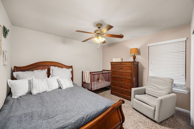 15003 Moonlight Mist Dr, Humble, TX 77346 - bedroom with carpet floors and ceiling fan