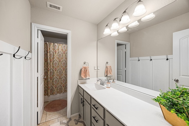15003 Moonlight Mist Dr, Humble, TX 77346 - bathroom with vanity and tile patterned floors