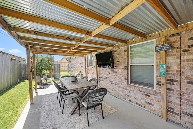 15003 Moonlight Mist Dr, Humble, TX 77346 - fenced backyard featuring a patio and outdoor dining area