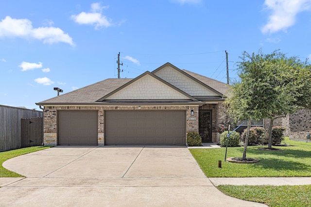 15003 Moonlight Mist Dr, Humble, TX 77346 - view of front of home with a garage, driveway, and brick siding
