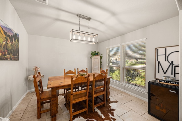 15003 Moonlight Mist Dr, Humble, TX 77346 - dining space featuring light tile patterned flooring and baseboards