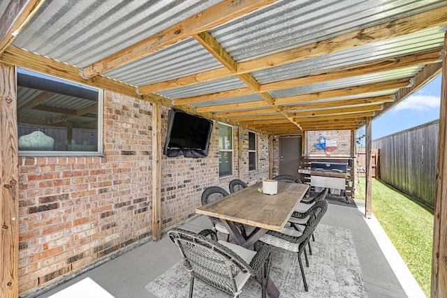 15003 Moonlight Mist Dr, Humble, TX 77346 - fenced backyard featuring outdoor dining space, a grill, and a patio area