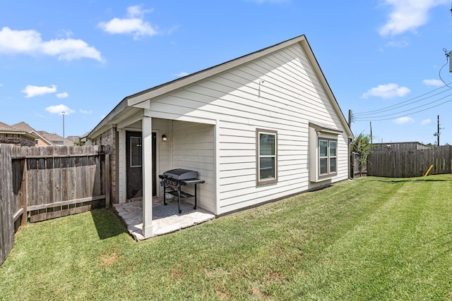 15003 Moonlight Mist Dr, Humble, TX 77346 - back of property featuring a fenced backyard and a patio area