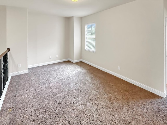 18614 Rimini Ridge Ct, Cypress, TX 77429 - spare room featuring carpet floors and baseboards