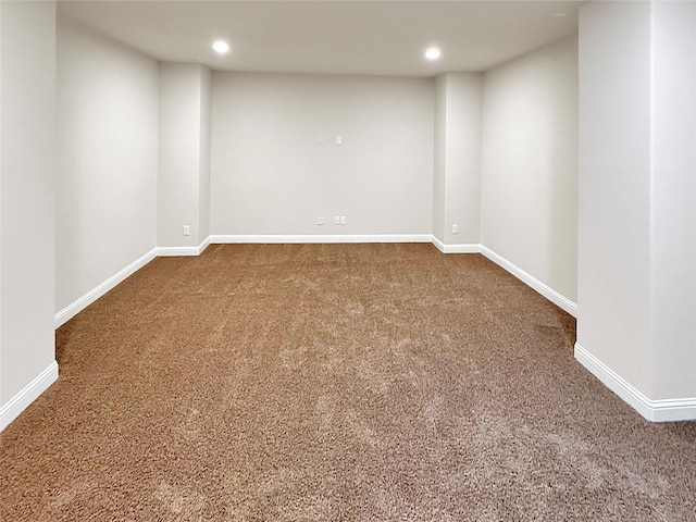 18614 Rimini Ridge Ct, Cypress, TX 77429 - empty room featuring dark carpet and recessed lighting