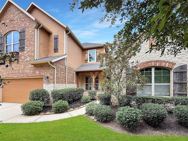 18614 Rimini Ridge Ct, Cypress, TX 77429 - view of front of property featuring a garage and brick siding