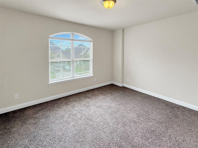 18614 Rimini Ridge Ct, Cypress, TX 77429 - spare room with carpet and baseboards