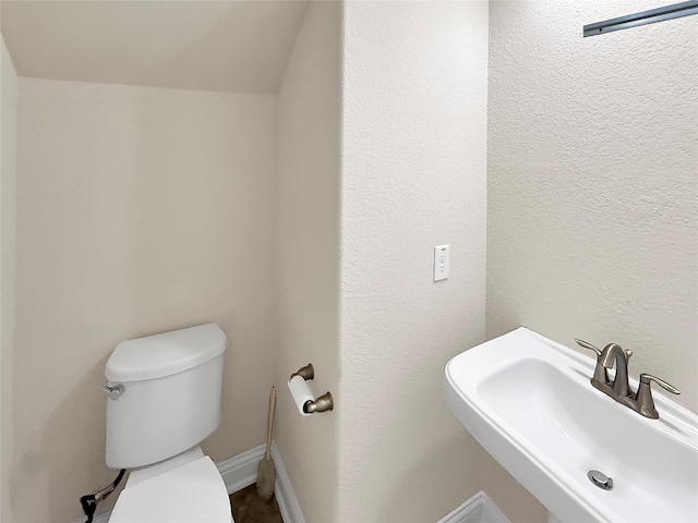 18614 Rimini Ridge Ct, Cypress, TX 77429 - bathroom featuring a sink and toilet