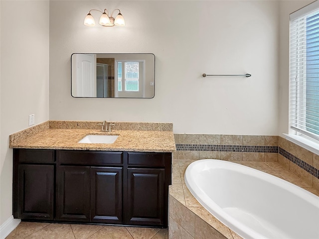 18614 Rimini Ridge Ct, Cypress, TX 77429 - full bath featuring vanity, a bath, plenty of natural light, and tile patterned floors