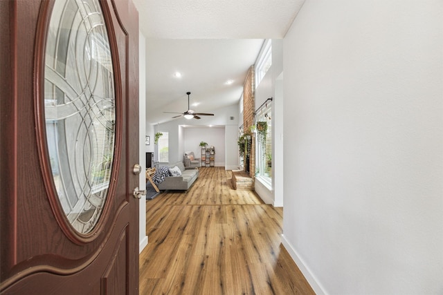 1818 Berryfield Dr, Houston, TX 77077 - foyer entrance featuring light wood-style flooring and a ceiling fan