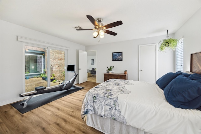 1818 Berryfield Dr, Houston, TX 77077 - bedroom featuring wood finished floors and ceiling fan