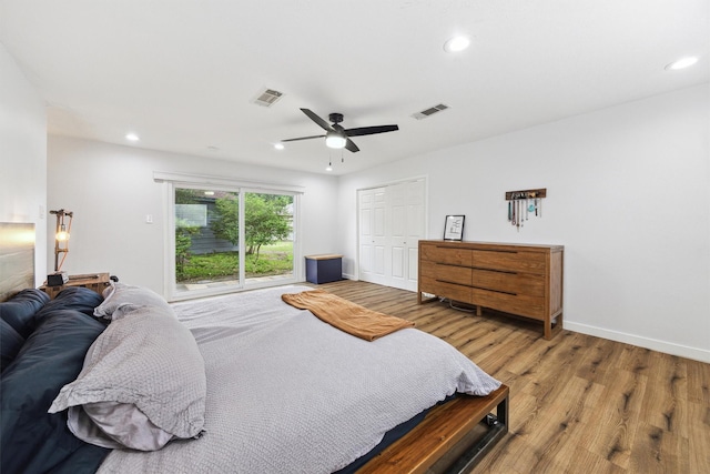 1818 Berryfield Dr, Houston, TX 77077 - bedroom featuring access to exterior, wood finished floors, recessed lighting, ceiling fan, and a closet
