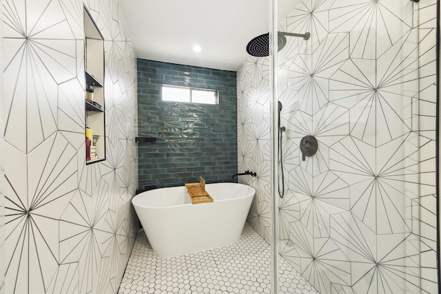 1818 Berryfield Dr, Houston, TX 77077 - full bath featuring tiled shower, tile walls, a freestanding tub, and tile patterned floors