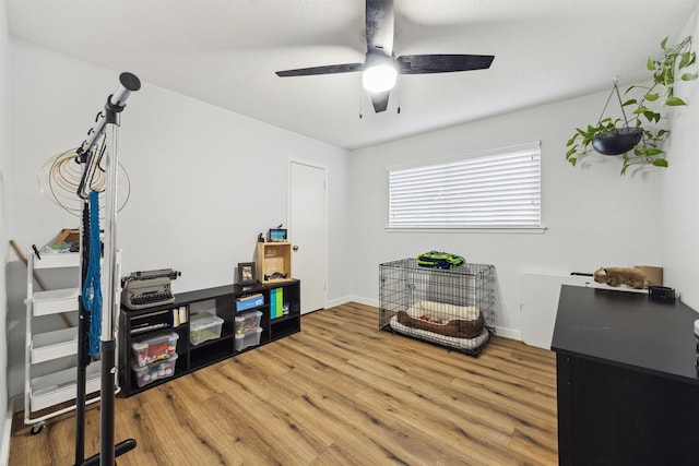1818 Berryfield Dr, Houston, TX 77077 - misc room with wood finished floors and a ceiling fan