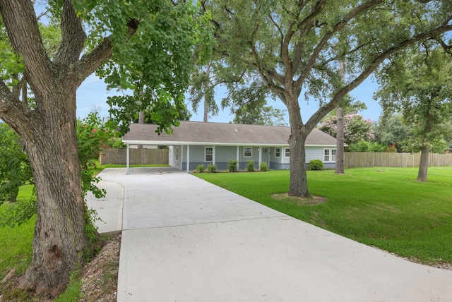 519 N Shady Ln, La Porte, TX 77571 - single story home with concrete driveway and an attached carport