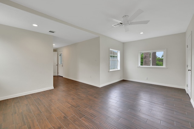 519 N Shady Ln, La Porte, TX 77571 - spare room featuring ceiling fan, recessed lighting, and dark wood-type flooring