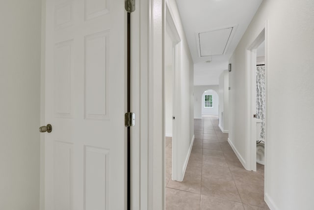 519 N Shady Ln, La Porte, TX 77571 - corridor with attic access and light tile patterned flooring