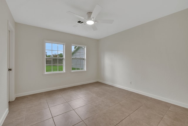 519 N Shady Ln, La Porte, TX 77571 - unfurnished room featuring light tile patterned floors and a ceiling fan