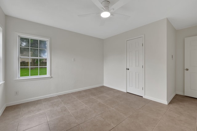 519 N Shady Ln, La Porte, TX 77571 - unfurnished room with ceiling fan and light tile patterned floors