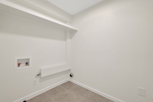 519 N Shady Ln, La Porte, TX 77571 - washroom featuring hookup for a washing machine, light tile patterned floors, and gas dryer hookup