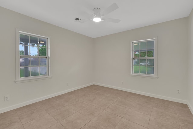 519 N Shady Ln, La Porte, TX 77571 - unfurnished room featuring a ceiling fan and light tile patterned floors