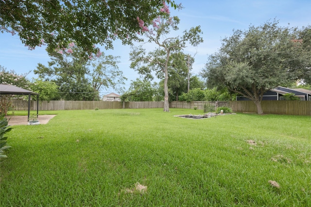 519 N Shady Ln, La Porte, TX 77571 - fenced backyard with a gazebo