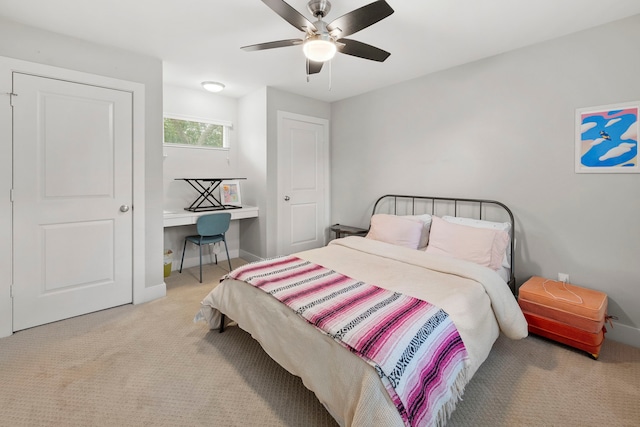 7539 Santa Fe Dr, Houston, TX 77061 - carpeted bedroom with a desk and ceiling fan