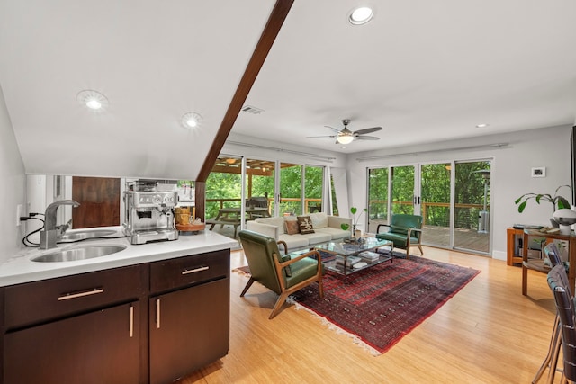 7539 Santa Fe Dr, Houston, TX 77061 - living area featuring ceiling fan, light wood finished floors, plenty of natural light, and recessed lighting