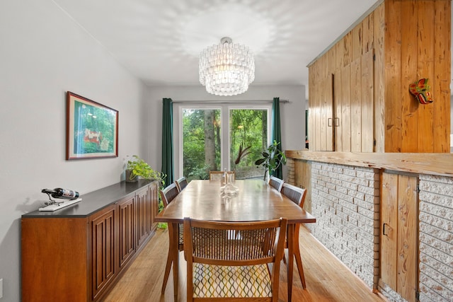 7539 Santa Fe Dr, Houston, TX 77061 - dining area with light wood-style flooring and a chandelier