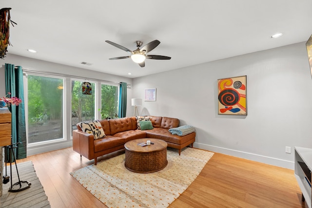 7539 Santa Fe Dr, Houston, TX 77061 - living area with a ceiling fan, recessed lighting, and light wood-type flooring