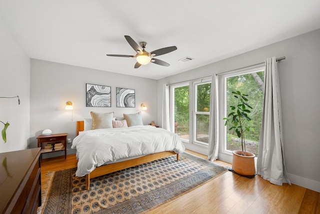 7539 Santa Fe Dr, Houston, TX 77061 - bedroom featuring wood finished floors and ceiling fan