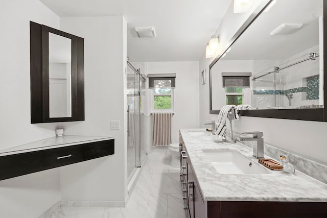 7539 Santa Fe Dr, Houston, TX 77061 - bathroom featuring marble finish flooring, double vanity, and a shower stall