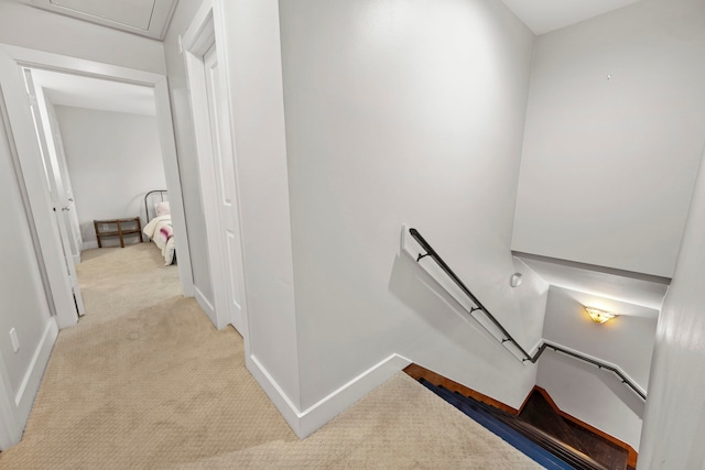 7539 Santa Fe Dr, Houston, TX 77061 - hallway featuring an upstairs landing and light carpet