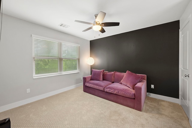 7539 Santa Fe Dr, Houston, TX 77061 - carpeted living room with ceiling fan and baseboards