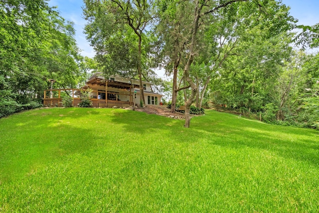 7539 Santa Fe Dr, Houston, TX 77061 - view of grassy yard with a deck