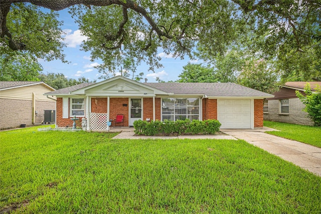 10434 Hinds St, Houston, TX 77034 - ranch-style home featuring an attached garage, concrete driveway, a front yard, and brick siding