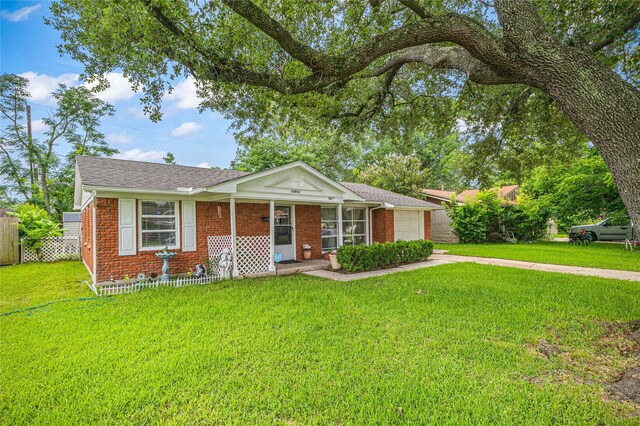 10434 Hinds St, Houston, TX 77034 - single story home featuring brick siding, a garage, and driveway