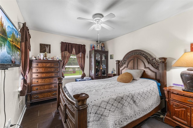 10434 Hinds St, Houston, TX 77034 - bedroom with dark wood-style floors and a ceiling fan