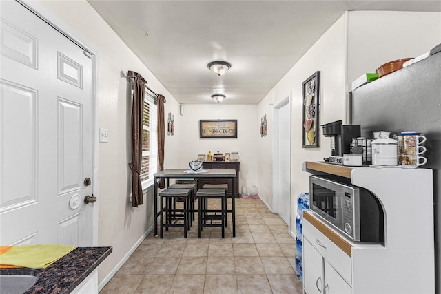 10434 Hinds St, Houston, TX 77034 - dining space featuring light tile patterned flooring