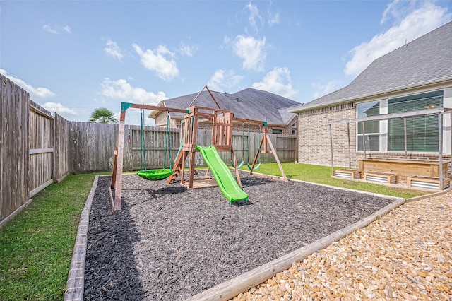 4107 Rainflower Ct, Fulshear, TX 77441 - view of playground with a fenced backyard