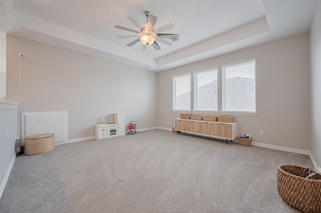 4107 Rainflower Ct, Fulshear, TX 77441 - unfurnished room featuring a tray ceiling, a ceiling fan, and carpet
