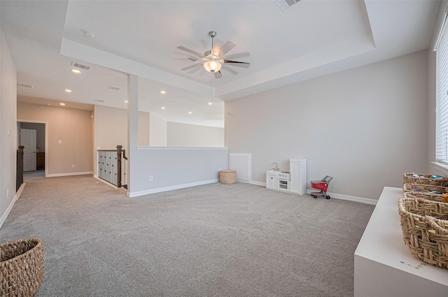 4107 Rainflower Ct, Fulshear, TX 77441 - playroom featuring light carpet, a ceiling fan, recessed lighting, and a tray ceiling