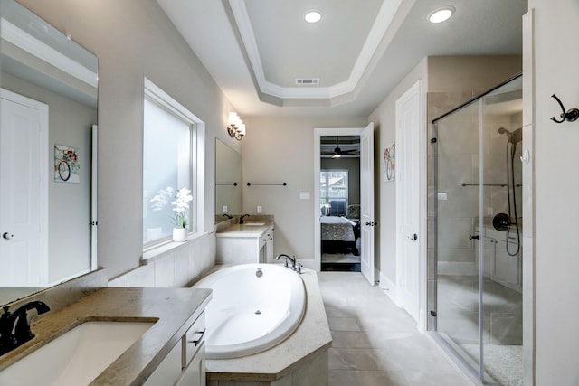 19222 Bullard Creek Dr, Cypress, TX 77433 - bathroom with two vanities, a stall shower, ensuite bathroom, a garden tub, and a ceiling fan